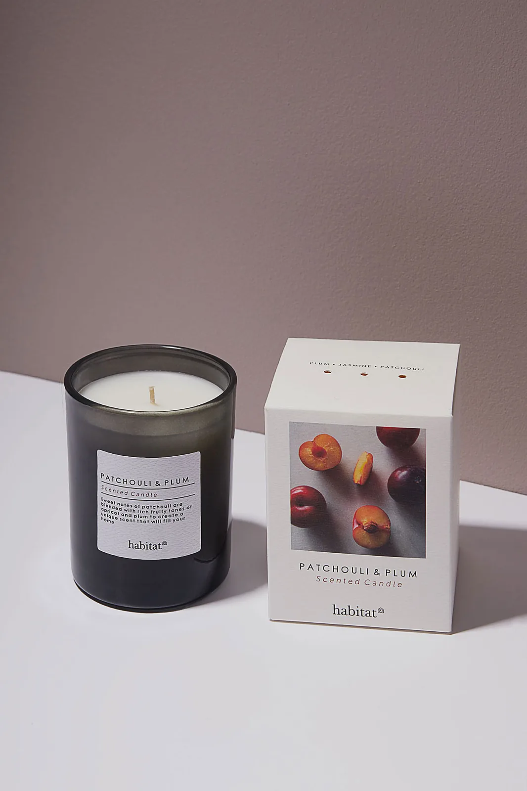 Candle packaging photography — scented candle with its gift box