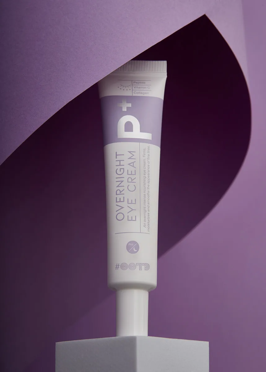 Skincare product photography styled with paper props.