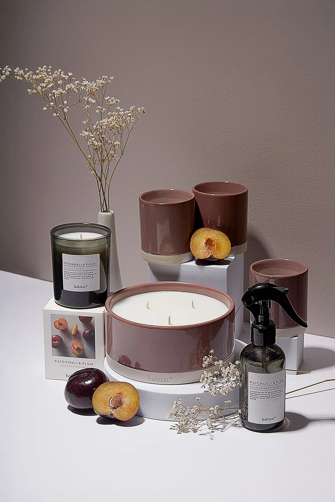 Home fragrance product photography — full range styled as one collection