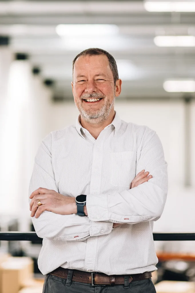 London corporate headshots for an "about us" page — a warm, professional portrait suited to a team bio.